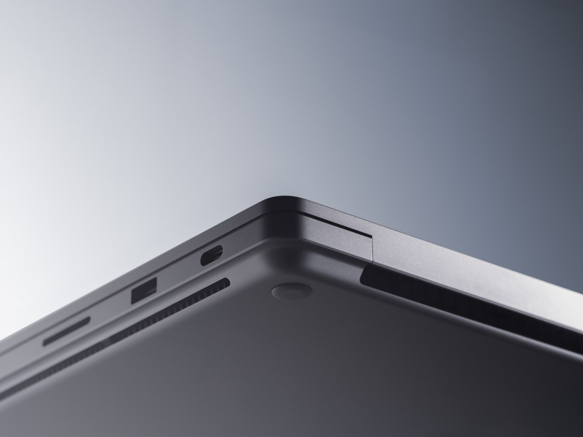 Macro view of the built-in ports on a Platinum Surface Laptop Ultra