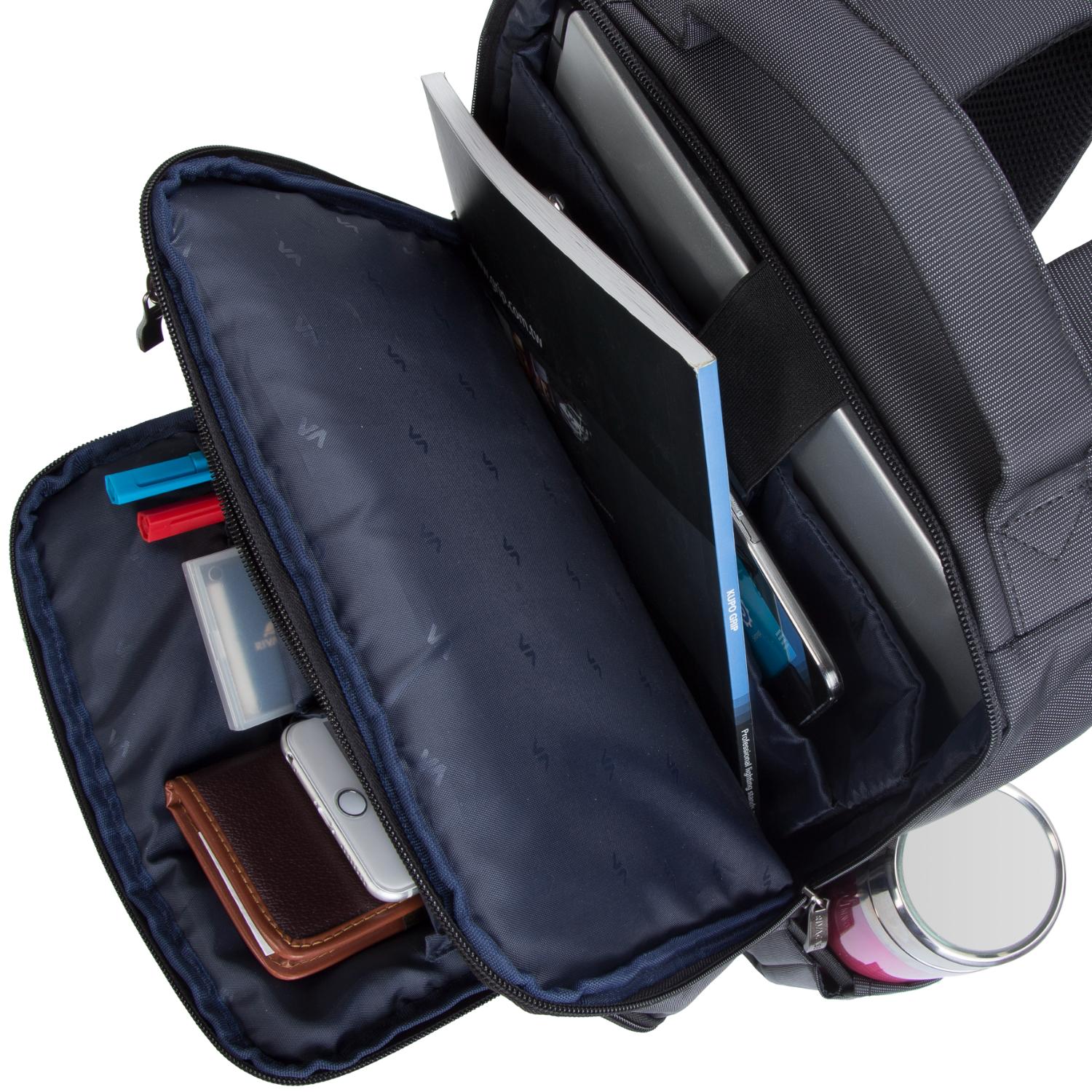 RIVACASE 8262 Central Laptop Backpack 15.6-inch – Black — Open compartments; contents shown for storage illustration and excluded