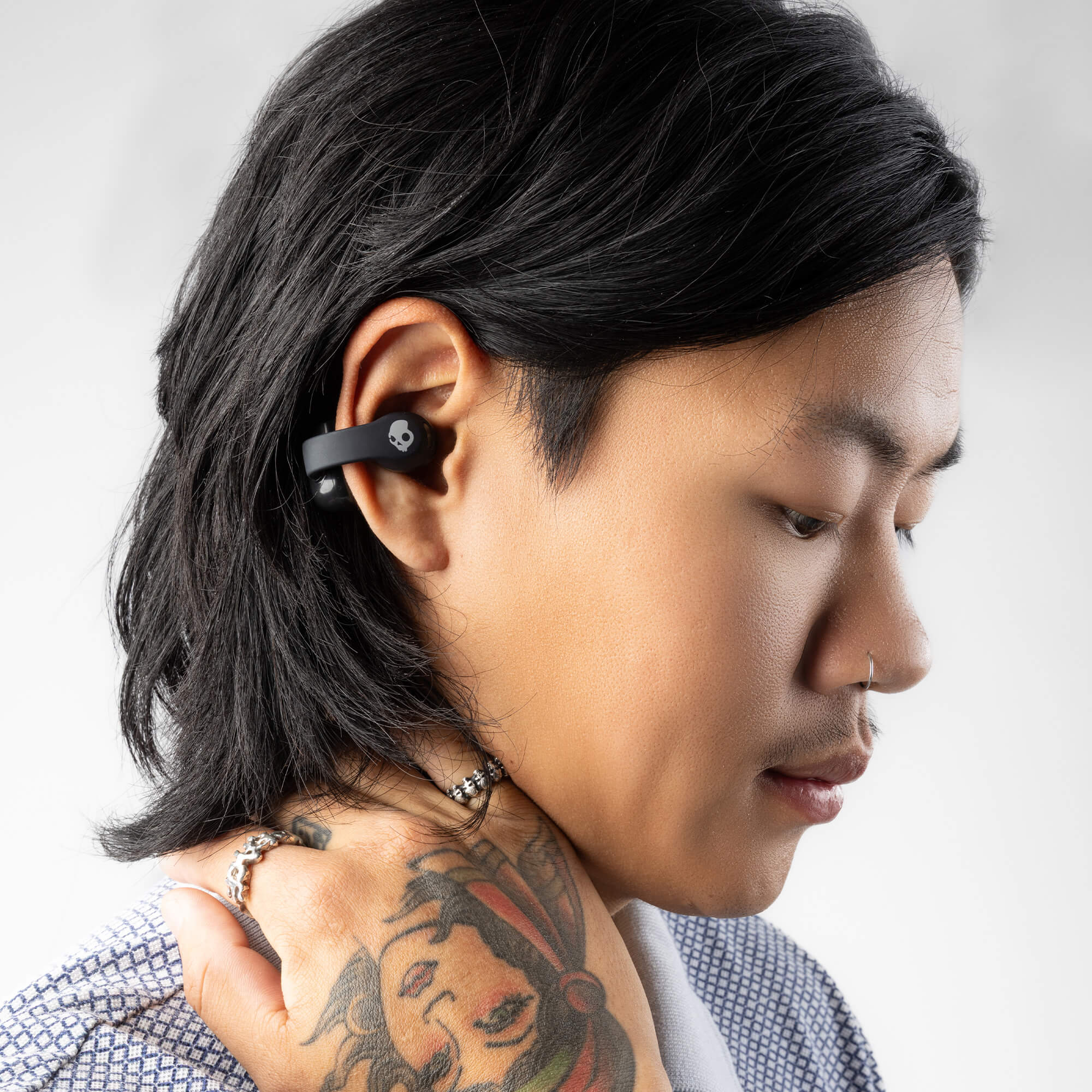 Skullcandy Push® 720 – Black — Earbuds worn, side view